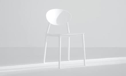 A plastic white chair